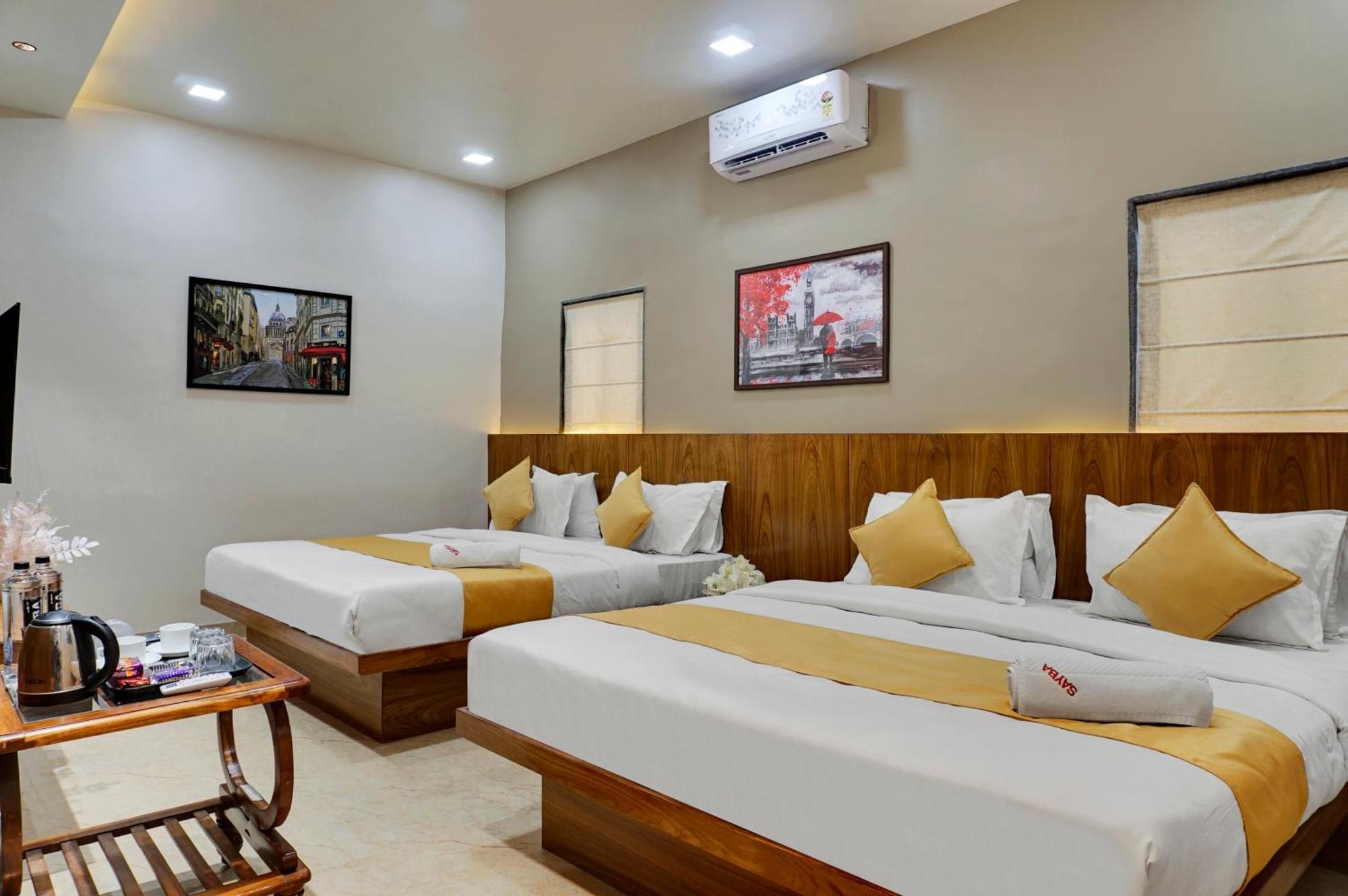 Hotel Sayba Executive Púna Kültér fotó