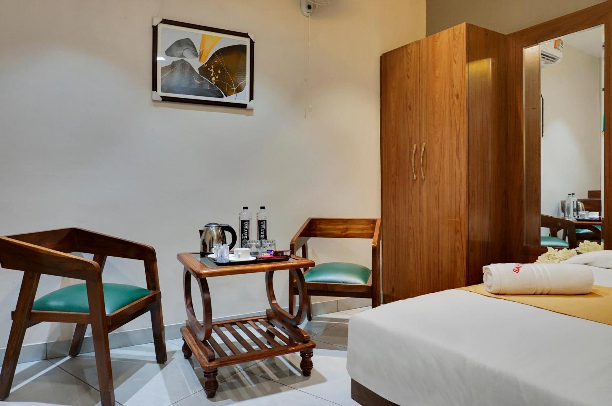 Hotel Sayba Executive Púna Kültér fotó